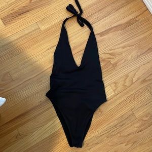 Ribbed black halter plunge back one piece.